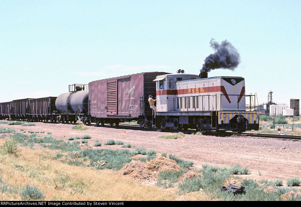 Pecos Valley Southern GE #7 adds two cars to their train.